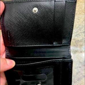 Coach black wallet. No defects. Brand new.